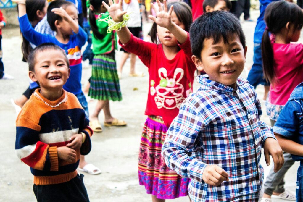 Happy colorful children smiling and dancing